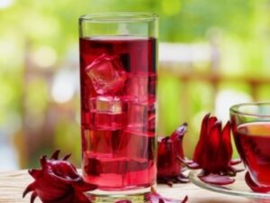Herbal Iced Teas - a glass of red liquid with ice cubes