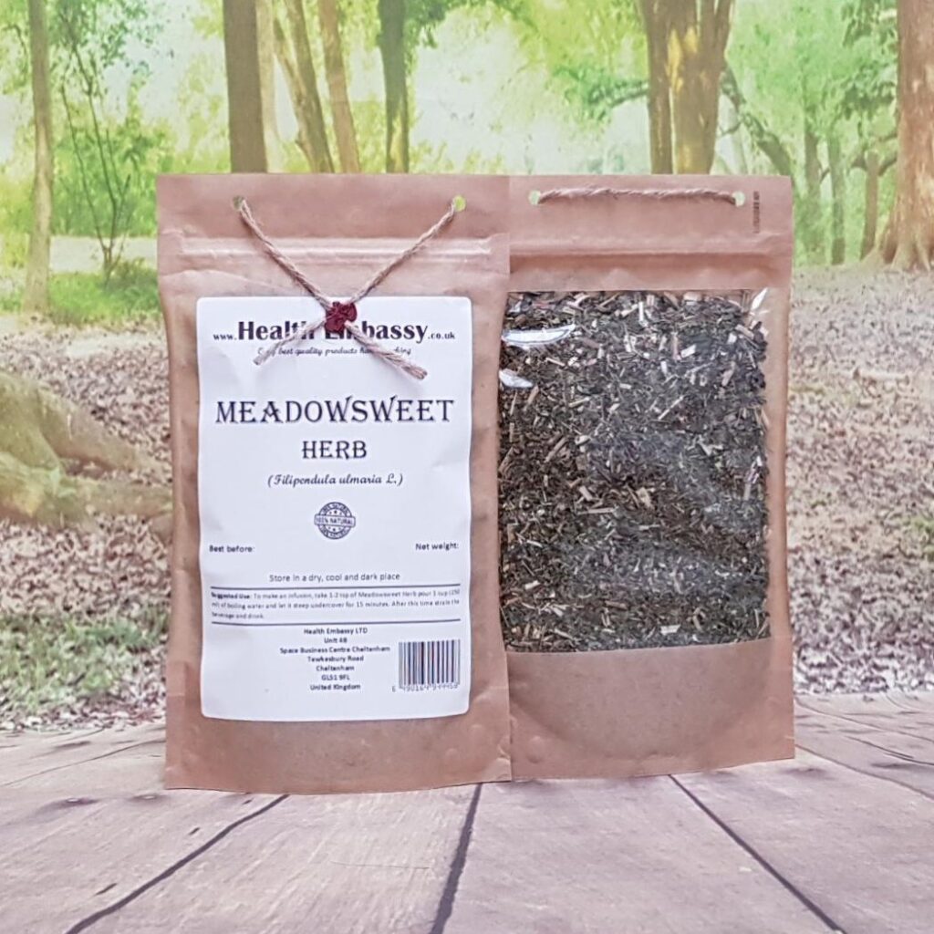 Health Embassy pure dried Meadowsweet Herb in brown paper bag on wooden table with green background