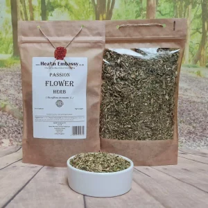 Organic Passion Flower Herb by Health Embassy in a paper bag on wooden surface with green background