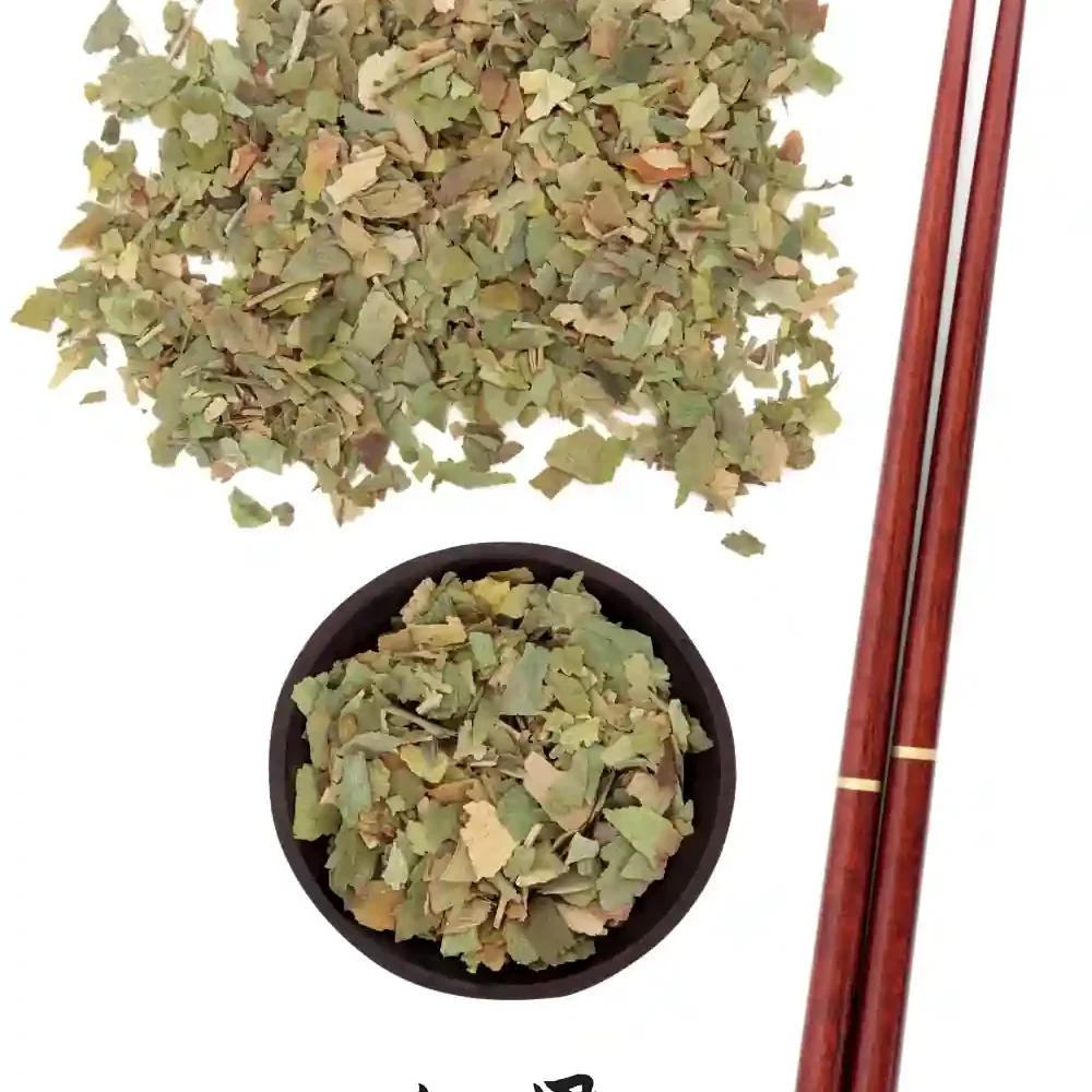 Top view of dried Ginkgo Biloba leaves in a small bowl with chopsticks