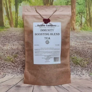 Health Embassy Immunity Boosting Blend Tea in brown paper tea bag with clear window, filled with dried herbs
