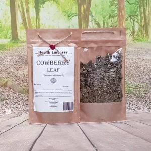 Dried Cowberry Leaf from Health Embassy in kraft paper bag on wooden surface with green natural background