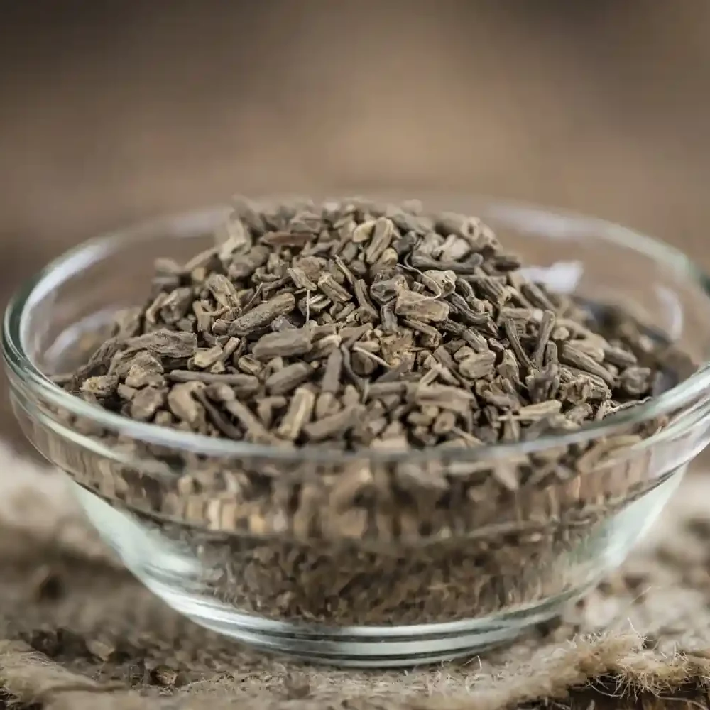 Dried natural Valerian Root pieces in a clear glass bowl on burlap cloth – Health Embassy