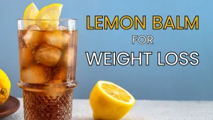 Lemon Balm for weight loss tea in a highball glass with lemon slices and ice, refreshing herbal drink by Health Embassy